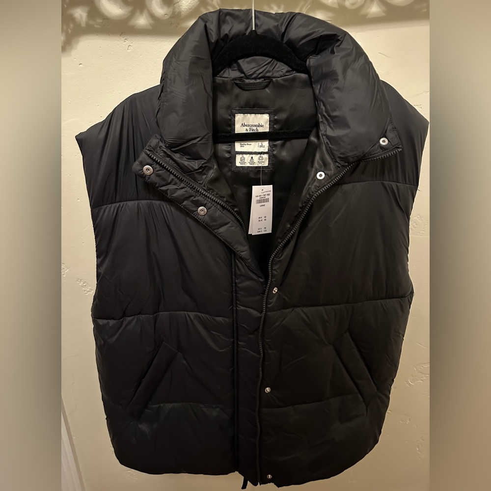 Abercrombie and Fitch black puffer vest.